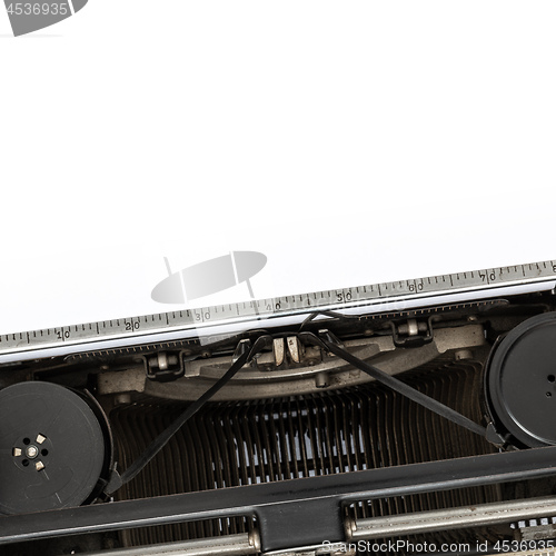 Image of Vintage typewriter with blank sheet of paper retro technology