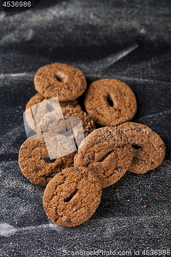 Image of Double chocolate chip fresh cookies heap.