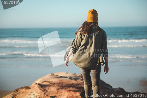 Image of Beautiful woman on the beach