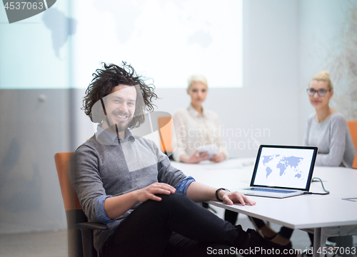 Image of Startup Business Team At A Meeting at modern night office buildi
