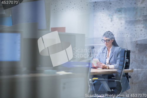 Image of Businesswoman using tablet