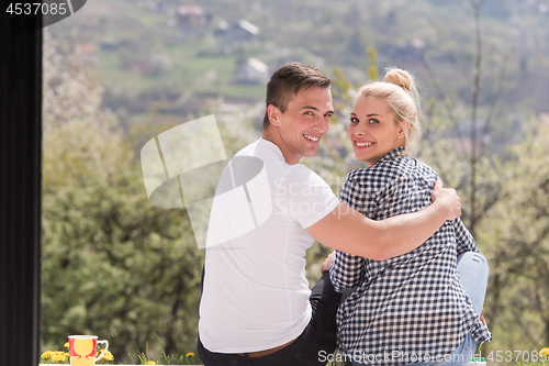 Image of couple enjoying morning coffee