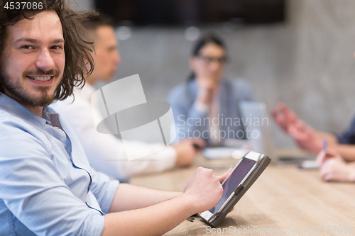 Image of Startup Business Team At A Meeting at modern office building