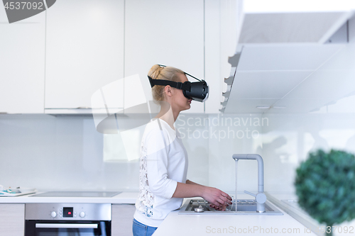 Image of woman using VR-headset glasses of virtual reality