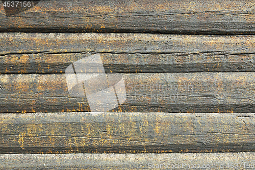 Image of wooden log house treated with pine tar