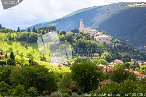 Image of Camerino in Italy Marche over colourful fields