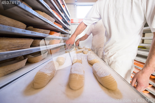 Image of bakers preparing the dough