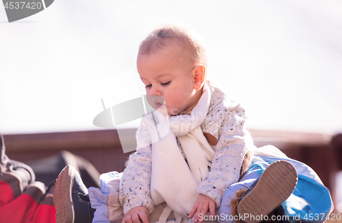 Image of portrait of little baby boy on beautiful winter day