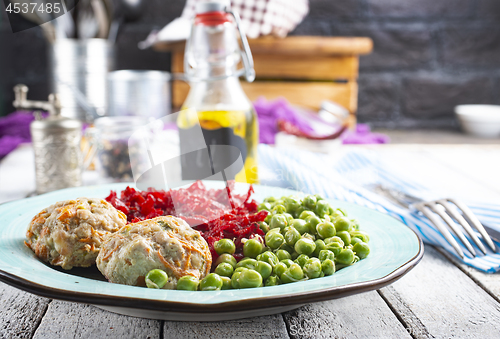 Image of cutlets with peas