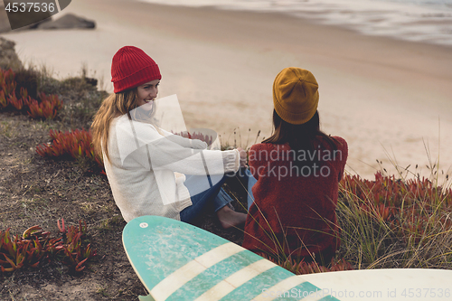 Image of Surfer girls at the beach