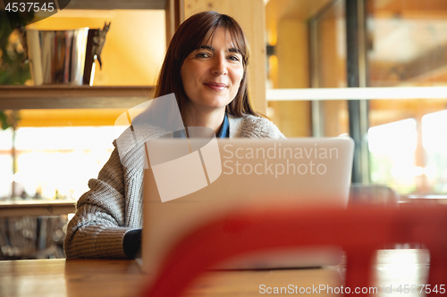 Image of Woman working on a laptop 