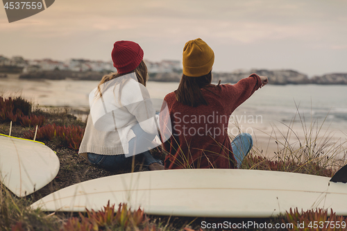 Image of Surfer girls at the beach