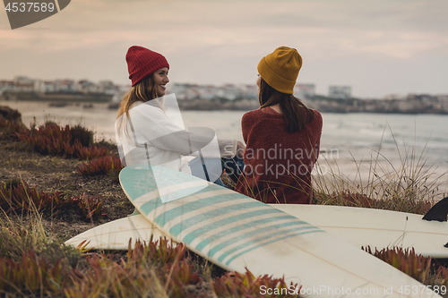 Image of Surfer girls at the beach