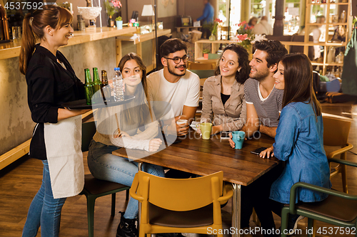 Image of Talking to the waitress