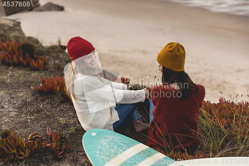 Image of Surfer girls at the beach