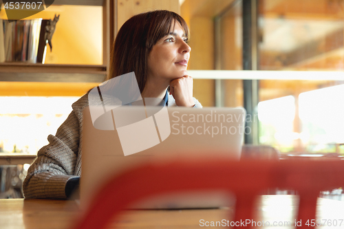 Image of Woman working on a laptop 