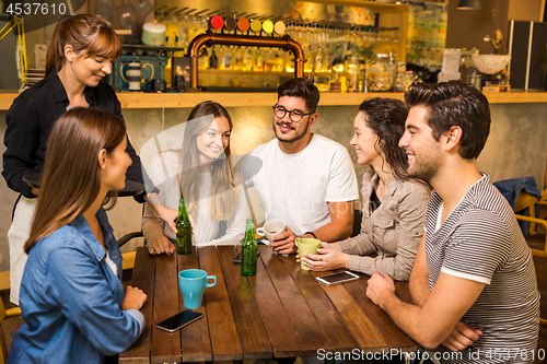 Image of Talking to the waitress