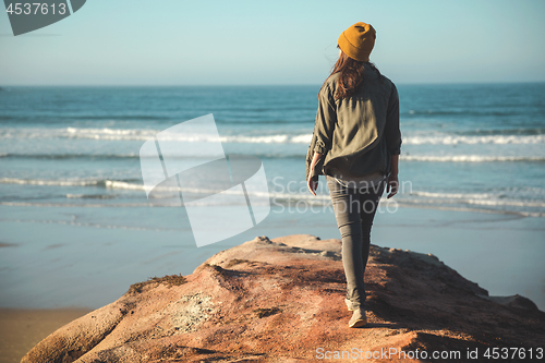 Image of Beautiful woman on the beach