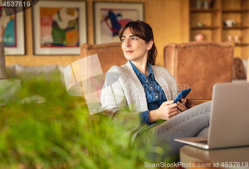 Image of Woman working on a laptop 