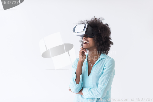 Image of black girl using VR headset glasses of virtual reality