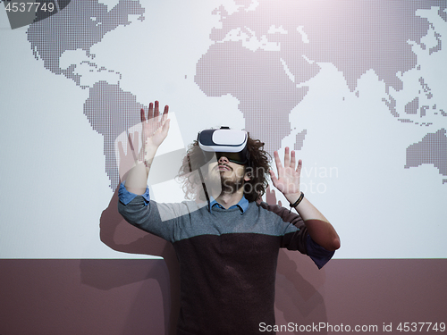 Image of businessman using VR-headset glasses of virtual reality