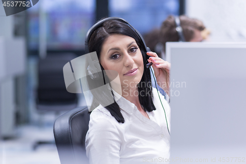 Image of female call centre operator doing her job