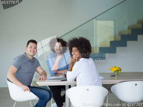 Image of Multiethnic startup Business Team At A Meeting at modern office 