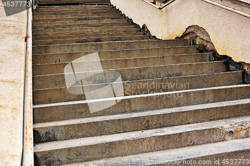 Image of detail of dampness on stair walls