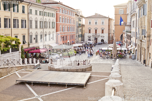 Image of Ancona, Italy - June 8 2019: People enjoying summer day and food