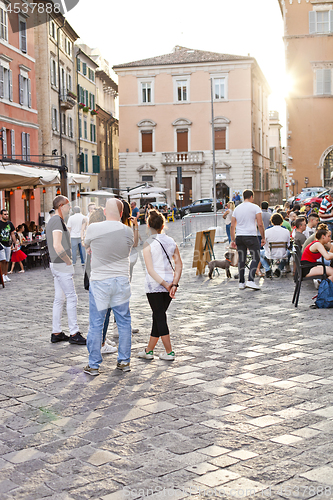 Image of Ancona, Italy - June 8 2019: People enjoying summer day and food