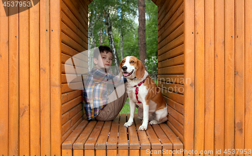 Image of Boy with his Dog Pet