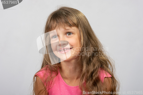 Image of Portrait of a beautiful eight-year-old gay girl of Europe who looks to the left