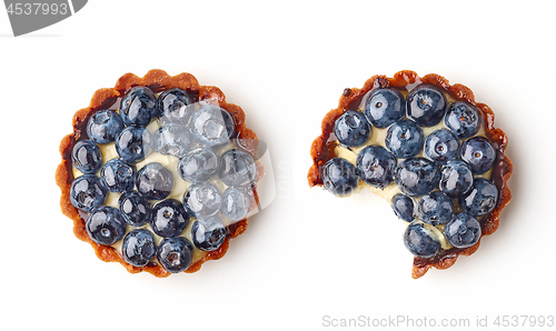 Image of blueberry tart on white background