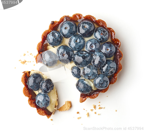 Image of blueberry tart on white background