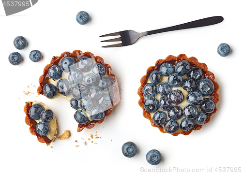 Image of blueberry tart on white background