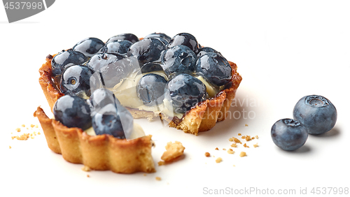 Image of blueberry tart on white background