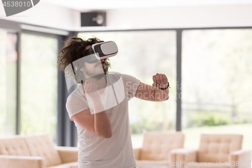 Image of man using VR-headset glasses of virtual reality