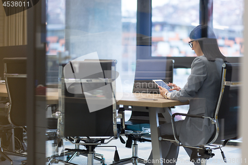 Image of Businesswoman using tablet