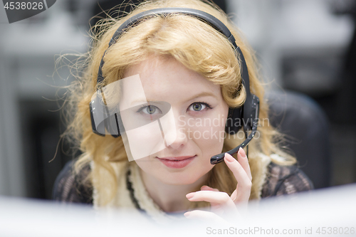 Image of female call centre operator doing her job