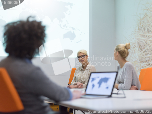 Image of Startup Business Team At A Meeting at modern night office buildi