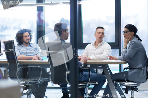 Image of Startup Business Team At A Meeting at modern office building