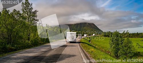 Image of VR Caravan car travels on the highway.