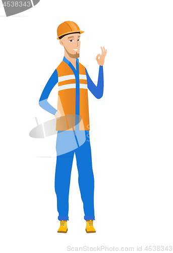 Image of Young caucasian builder showing ok sign.