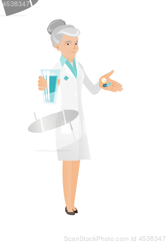 Image of Senior pharmacist giving pills and glass of water.