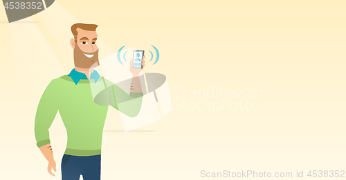 Image of Young caucasian man holding ringing mobile phone.