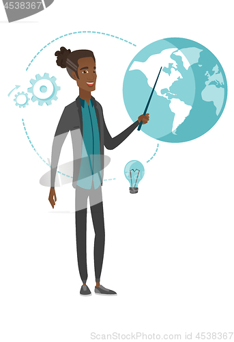 Image of Young african businessman pointing at a globe.