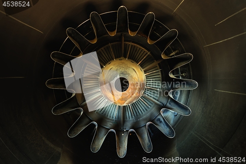 Image of Rusty old jet engine closeup as background