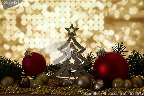 Image of Christmas symbols decoration red glass balls and bokeh lights