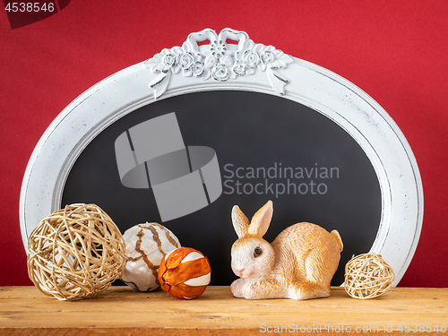 Image of Easter decoration rabbit and vintage frame