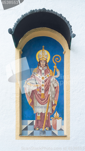 Image of bishop painting on a white wall